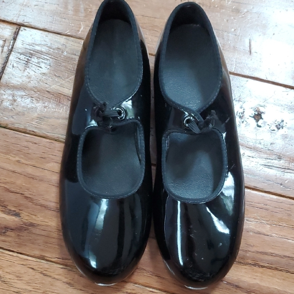 Black patent tap dance shoes